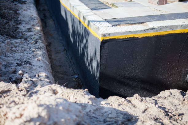Professional Waterproofing technician working in Cologne, MN